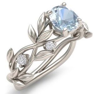Blue cz and sterling silver vine ring